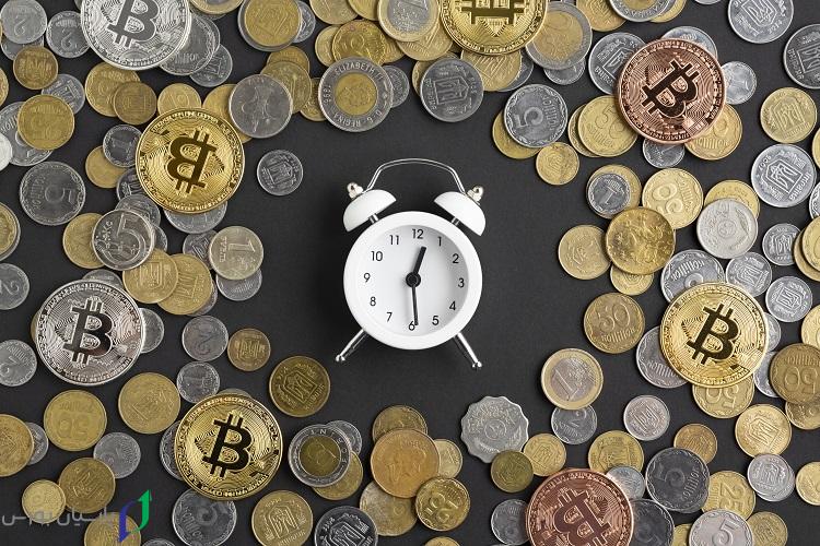 alarm clock surrounded by currency